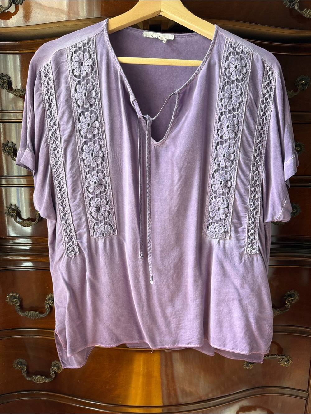 Vintage boho blouse with crochet lace accent trim.